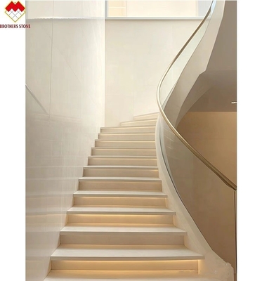 Escaleras curvas para interiores de color crema beige de mármol antideslizante