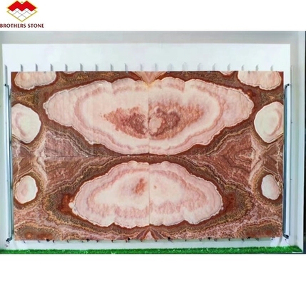 Libros de piedra de mármol de ónix rojo retroiluminado con matching de la losa para el patrón de mesa de mármol transparente
