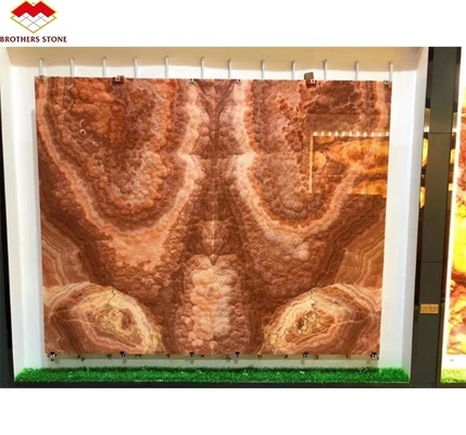 Libros de piedra de mármol de ónix rojo retroiluminado con matching de la losa para el patrón de mesa de mármol transparente