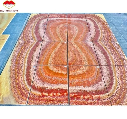 Libros de piedra de mármol de ónix rojo retroiluminado con matching de la losa para el patrón de mesa de mármol transparente