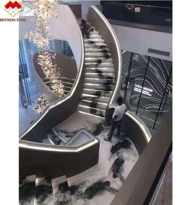 Escalera en espiral de piedra natural con luz LED y diseño antideslizante