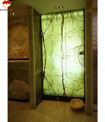 La losa de mármol de oníx verde natural es perfecta para revestimientos de paredes y encimeras de oníx con luz de fondo