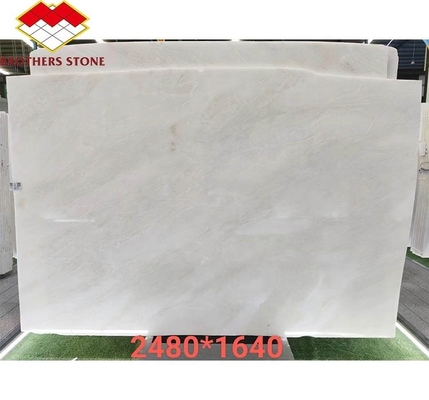 Solución de diseño gráfico de hoja de mármol de ónix blanco real moderna cortada a medida para panel de pared y conjunto de mesa de comedor