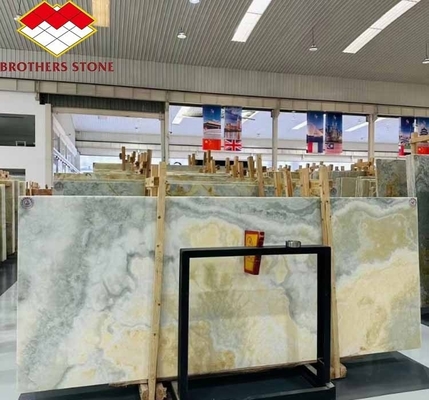 Moderno con luz de fondo Oníx de piedra de color verde 30 mm de espesor para el salón gráfico Pared de jade