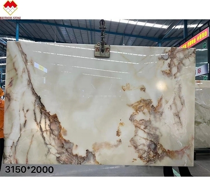 Venta directa de polvo translúcido retroiluminado de mármol blanco de ónix con flor roja de primera calidad
