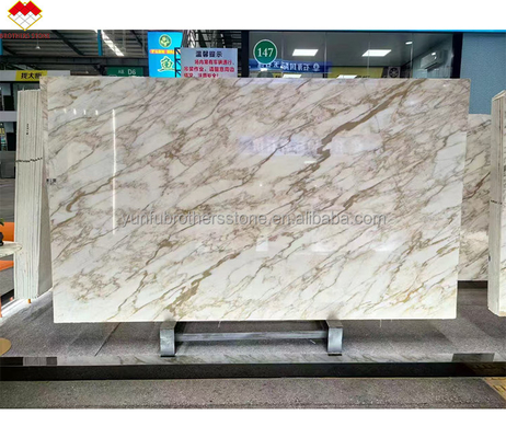 Comercio FOB Modern Calacatta Gold Marble Slab de Italia para el piso de la pared de la mesa superior