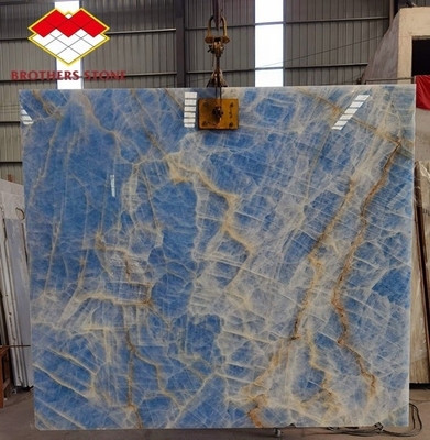 Lámina de ónix de mármol azul claro de jade para azulejos personalizados cortados a medida Venas de oro