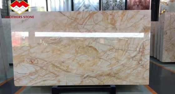 Ventas al por mayor de venas doradas retroiluminadas ónix araña translúcida blanco de oro granos de jade ónix piedra