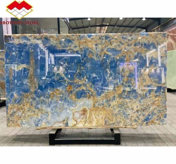 Piedra de mármol de ónix natural translúcida de ónix azul moderno para paredes y suelos de baño